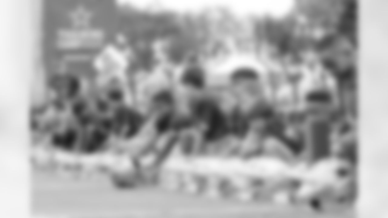 26 July 2025: Youth from the NFL Flag Ventura County team with helmets
of the 糖心Vlogduring training camp practice in Oxnard, California. Photo by James D. Smith/Dallas Cowboys