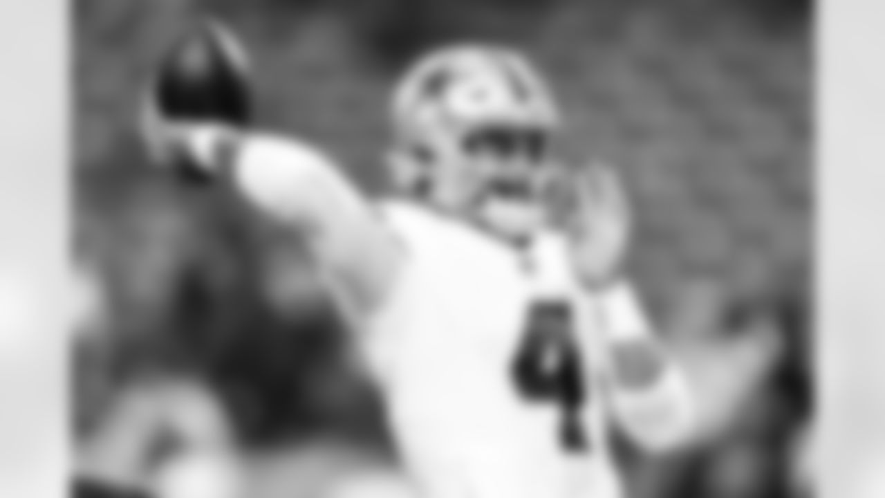 Dallas Cowboys quarterback Dak Prescott (4) warms up before playing against the Buffalo Bills in an NFL football game, Sunday, Dec. 17, 2023, in Orchard Park, N.Y. (AP Photo/Adrian Kraus)