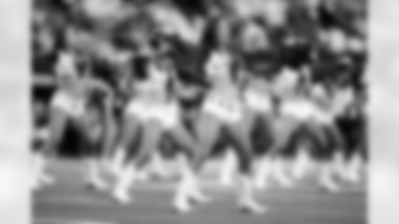 The Dallas Cowboy Cheerleaders perform before an NFL football game between the New York Giants and the Dallas Cowboys, Sunday, Nov. 12, 2023, in Arlington, Texas. (AP Photo/Julio Cortez)