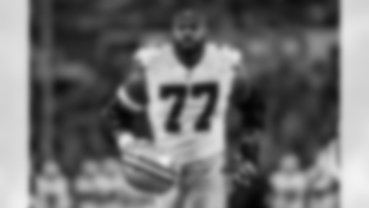 Dallas Cowboys offensive tackle Tyron Smith (77) runs off the field before an NFL football game, Sunday, Dec. 17, 2023, in Orchard Park, NY. (AP Photo/Matt Durisko)
