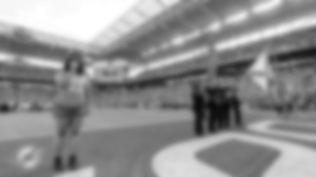 Faith Jackson sings the National Anthem before an NFL football game between the Miami Dolphins and Tampa Bay Buccaneers on Sunday, Dec. 28, 2025 in Miami Gardens, FL. (Jose Pineiro/Miami Dolphins via AP)