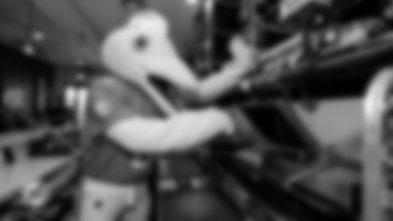 TD presses a Cuban sandwich at Sanguich.