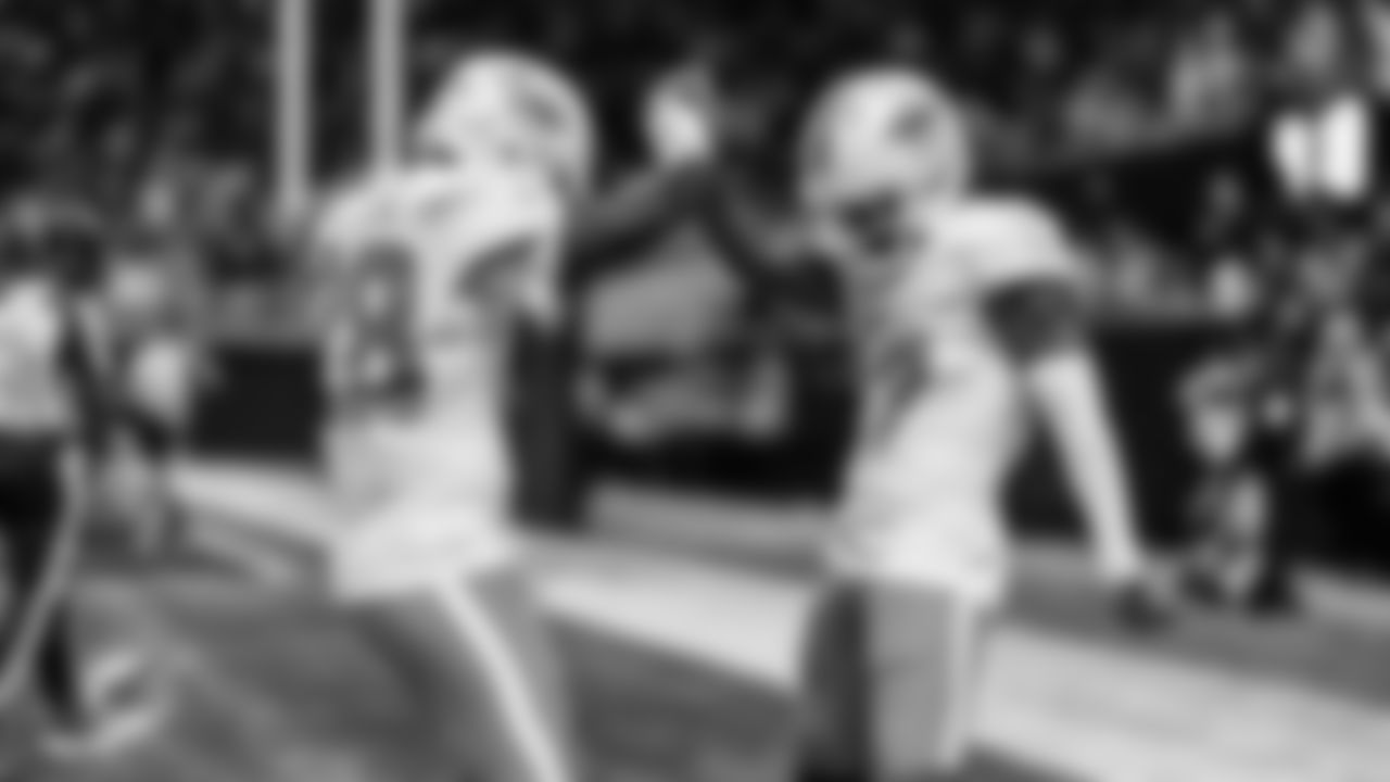 Miami Dolphins running back De'Von Achane (28) and wide receiver Jaylen Waddle (17) celebrate during an NFL football game against the Atlanta Falcons on Sunday, Oct. 26, 2025 in Atlanta, GA. (Tomas Diniz Santos/Miami Dolphins via AP)