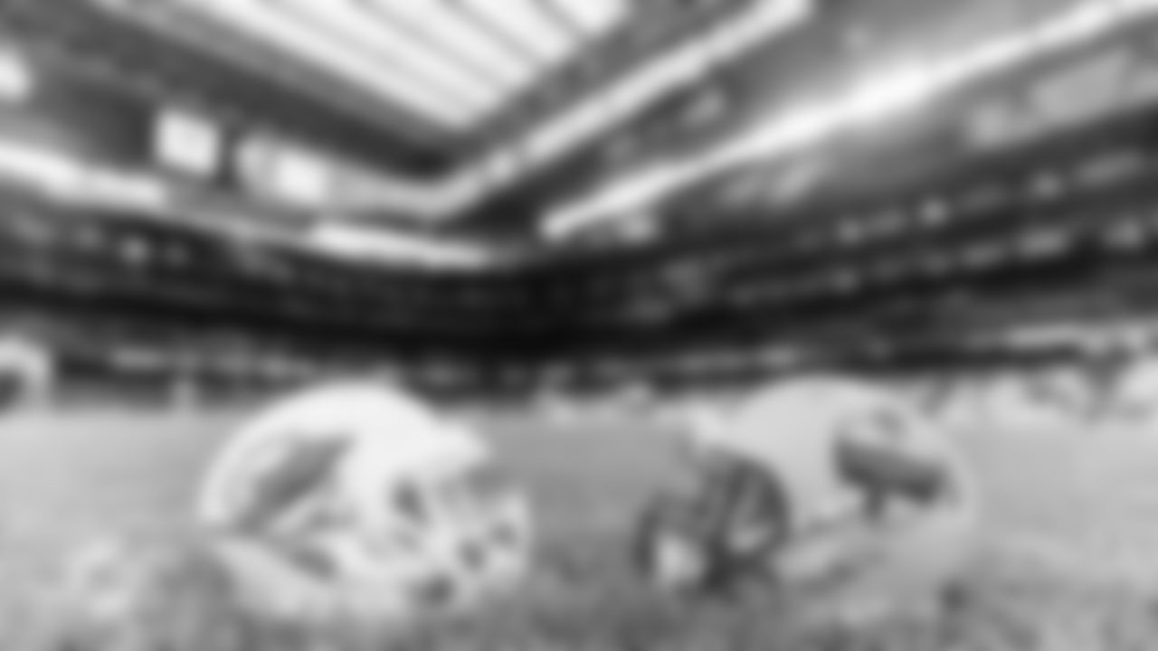 A Miami Dolphins helmet on the field at Bernabéu Stadium before an NFL football game against the Washington Commanders on Sunday, Nov. 16, 2025 in Madrid. (Tomas Diniz Santos/Miami Dolphins via AP)