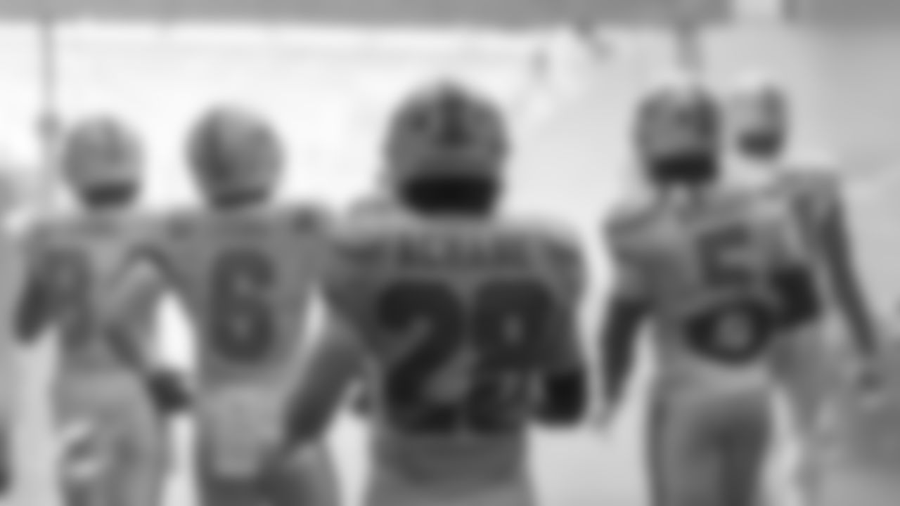 Miami Dolphins wide receivers Tahj Washington (84) and Malik Washington (6) and running backs De'Von Achane (28) and Jaylen Wright (5) exit the tunnel before an NFL football game against the Buffalo Bills on Sunday, Nov. 9, 2025 in Miami Gardens, Fla. (AJ Shorter/Miami Dolphins via AP)