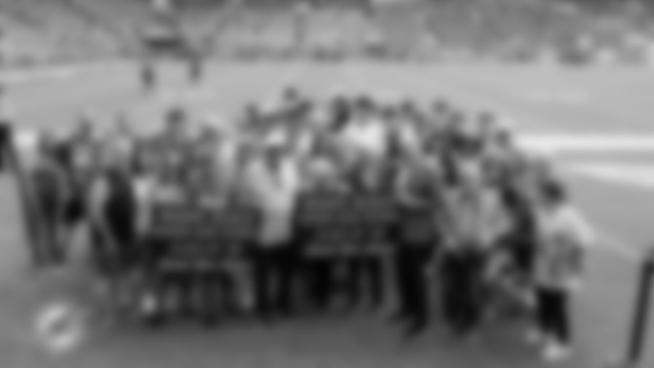 Miami Beach High School Class of '58 reunion meets with Miami Dolphins Owner Stephen M. Ross before an NFL football game against the New Orleans Saints on Sunday, Nov. 30, 2025 in Miami Gardens, FL. (Tomas Diniz Santos/Miami Dolphins via AP)