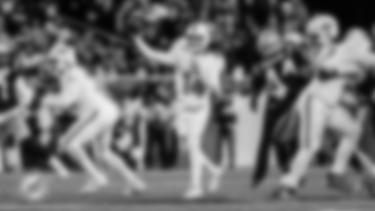 Miami Dolphins quarterback Quinn Ewers (14) throws the ball during an NFL football game against the New England Patriots on Sunday, Jan. 4, 2026 in Foxborough, MA. (Tomas Diniz Santos/Miami Dolphins via AP)
