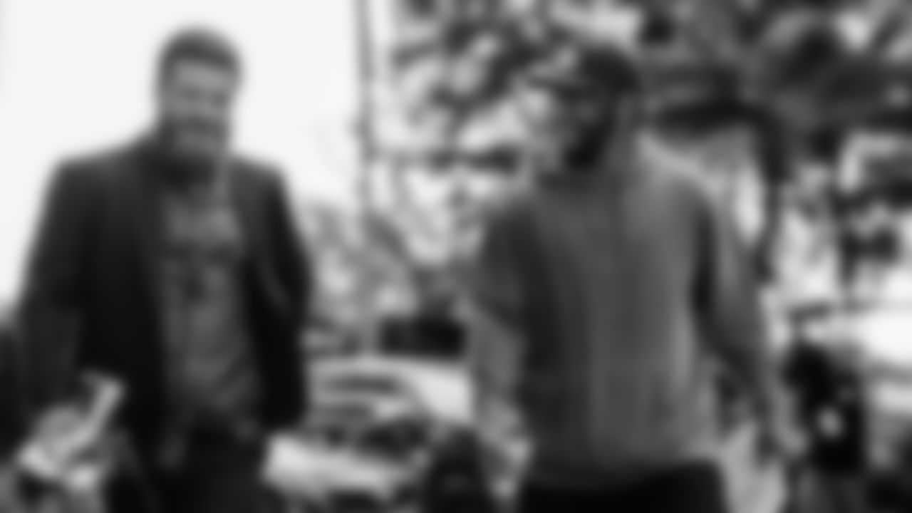 Former Miami Dolphins quarterback Ryan Fitzpatrick and current quarterback Tua Tagovailoa (1) arrive before an NFL football game against the Baltimore Ravens on Thursday, Oct. 30, 2025 in Miami Gardens, FL. (Tomas Diniz Santos/Miami Dolphins via AP)