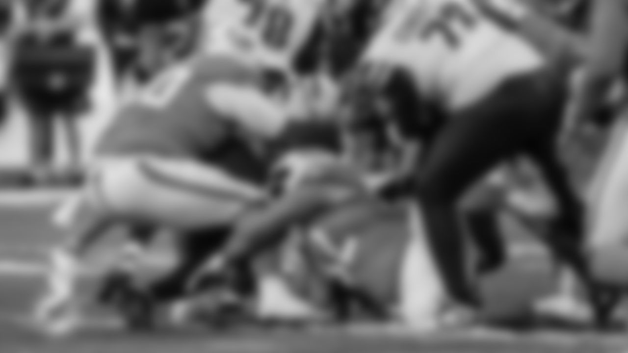 Miami Dolphins defensive tackles Kenneth Grant (90) and Zach Sieler (92) sack Washington Commanders quarterback Marcus Mariota (8) during an NFL football game on Sunday, Nov. 16, 2025 in Madrid. (Tomas Diniz Santos/Miami Dolphins via AP)