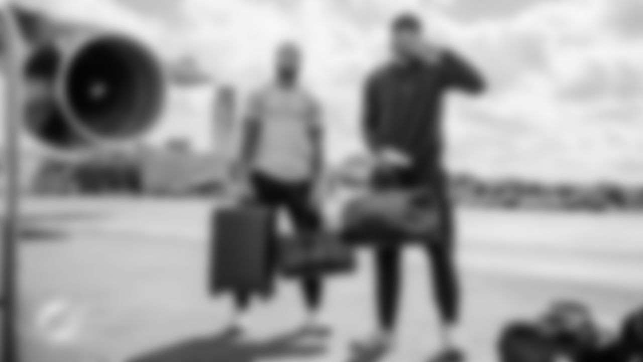 Miami Dolphins safety Dante Trader Jr. (11) and cornerback Rasul Douglas (26) during arrivals to the plane for travel to New York on Saturday, Dec. 6, 2025, in Fort Lauderdale, Fla. (Tomas Diniz Santos/Miami Dolphins)