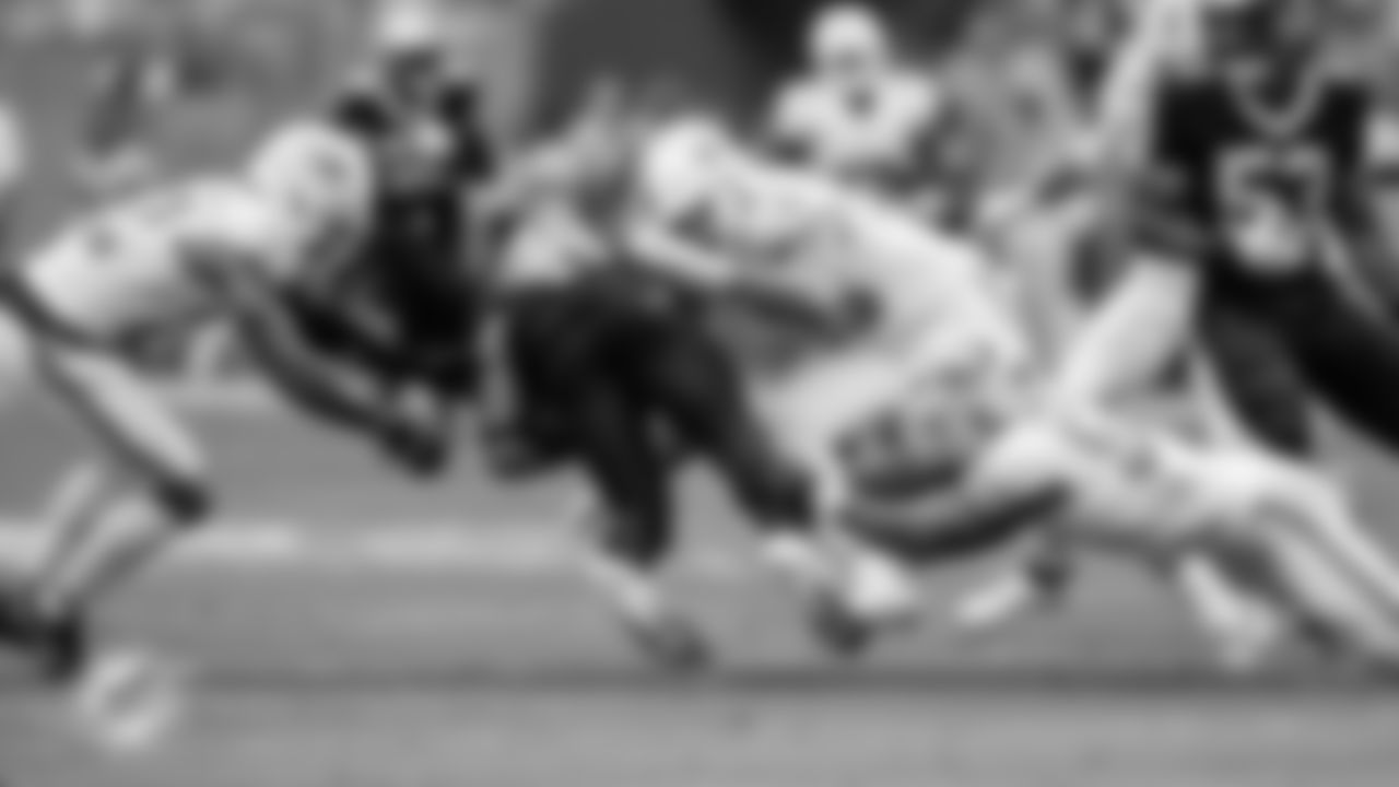 XX makes a tackle during an NFL football game against the New Orleans Saints on Sunday, Nov. 30, 2025 in Miami Gardens, FL. (Tomas Diniz Santos/Miami Dolphins via AP)