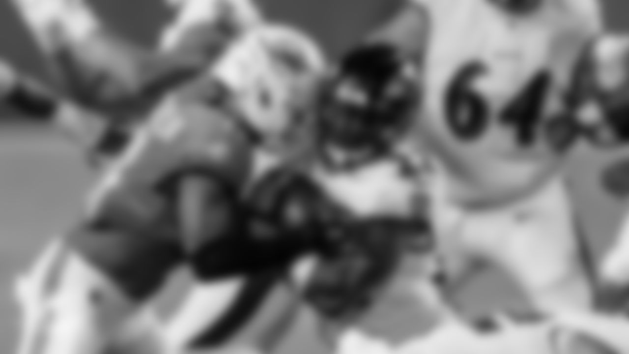 Miami Dolphins safety Dante Trader Jr. (11) makes a tackle during an NFL football game against the Baltimore Ravens on Thursday, Oct. 30, 2025 in Miami Gardens, FL. (Ruben Gonzalez/Miami Dolphins via AP)