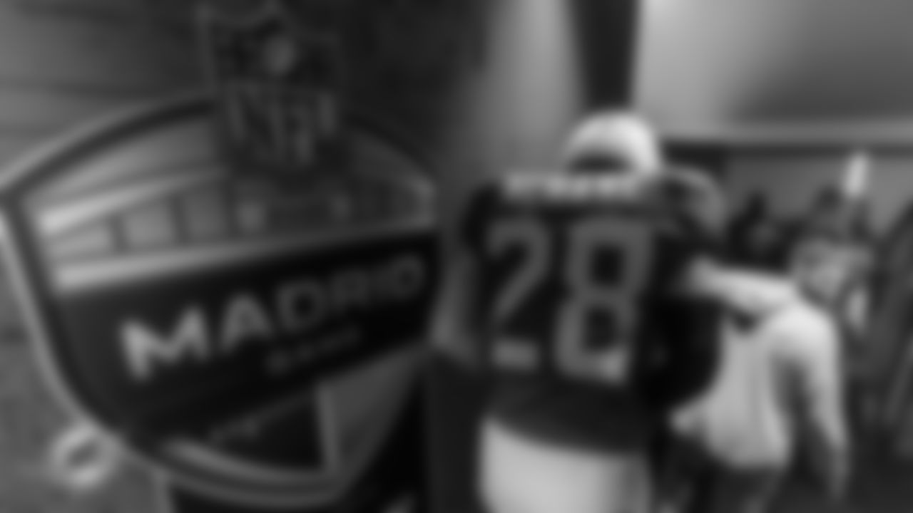 Miami Dolphins running back De'Von Achane (28) exits the tunnel before an NFL football game against the Washington Commanders on Sunday, Nov. 16, 2025 in Madrid. (Tomas Diniz Santos/Miami Dolphins via AP)