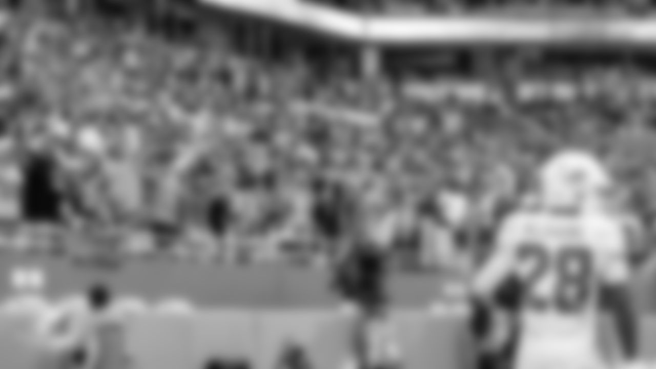 Miami Dolphins fans cheer on running back De'Von Achane (28) during an NFL football game against the Buffalo Bills on Sunday, Nov. 9, 2025 in Miami Gardens, Fla. (Kevin Tubbergen/Miami Dolphins via AP)