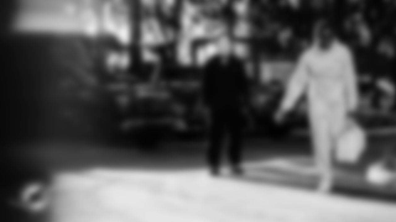 Miami Dolphins offensive lineman Aaron Brewer (55) and running back Ollie Gordon II (31) arrive before an NFL football game against the Baltimore Ravens on Thursday, Oct. 30, 2025 in Miami Gardens, FL. (Tomas Diniz Santos/Miami Dolphins via AP)