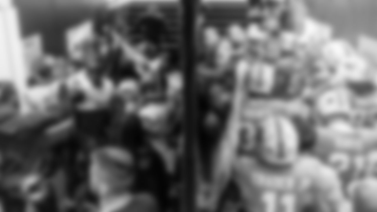 Washington Commanders and Miami Dolphins wait in the tunnel before an NFL football game Sunday, Nov. 16, 2025 in Madrid. (Tomas Diniz Santos/Miami Dolphins via AP)