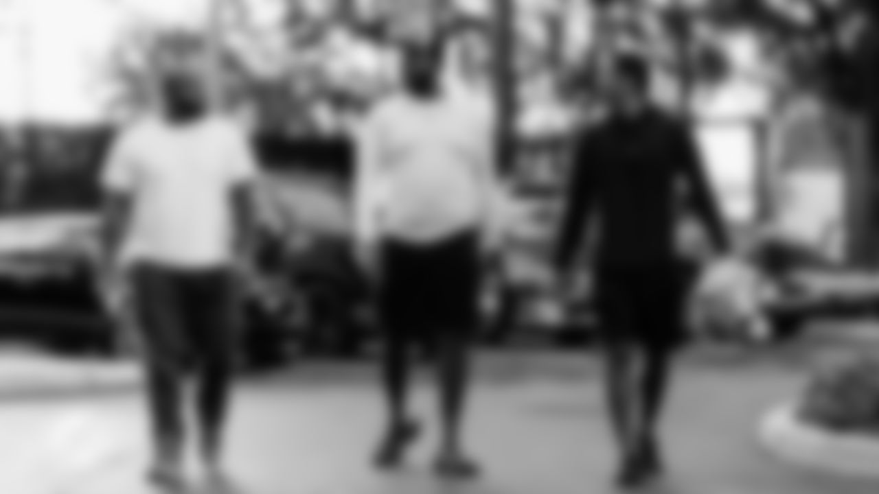 Miami Dolphins defensive tackle Benito Jones (95), offensive tackle Kadeem Telfort (75) and cornerback Rasul Douglas (26) arrive before an NFL football game against the Buffalo Bills on Sunday, Nov. 9, 2025 in Miami Gardens, Fla. (Tomas Diniz Santos/Miami Dolphins via AP)