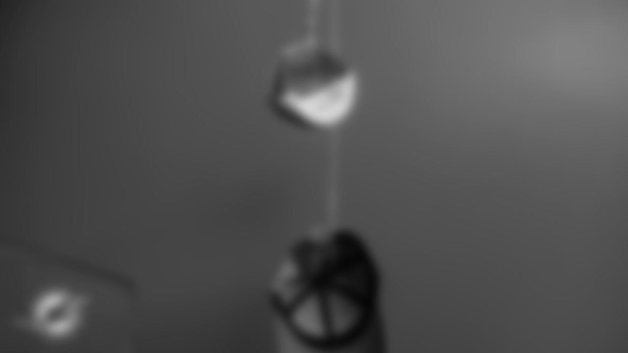 Miami Dolphins merch is hung down for autographs after an NFL football game against the Tampa Bay Buccaneers on Sunday, Dec. 28, 2025 in Miami Gardens, FL. (Jose Pineiro/Miami Dolphins via AP)