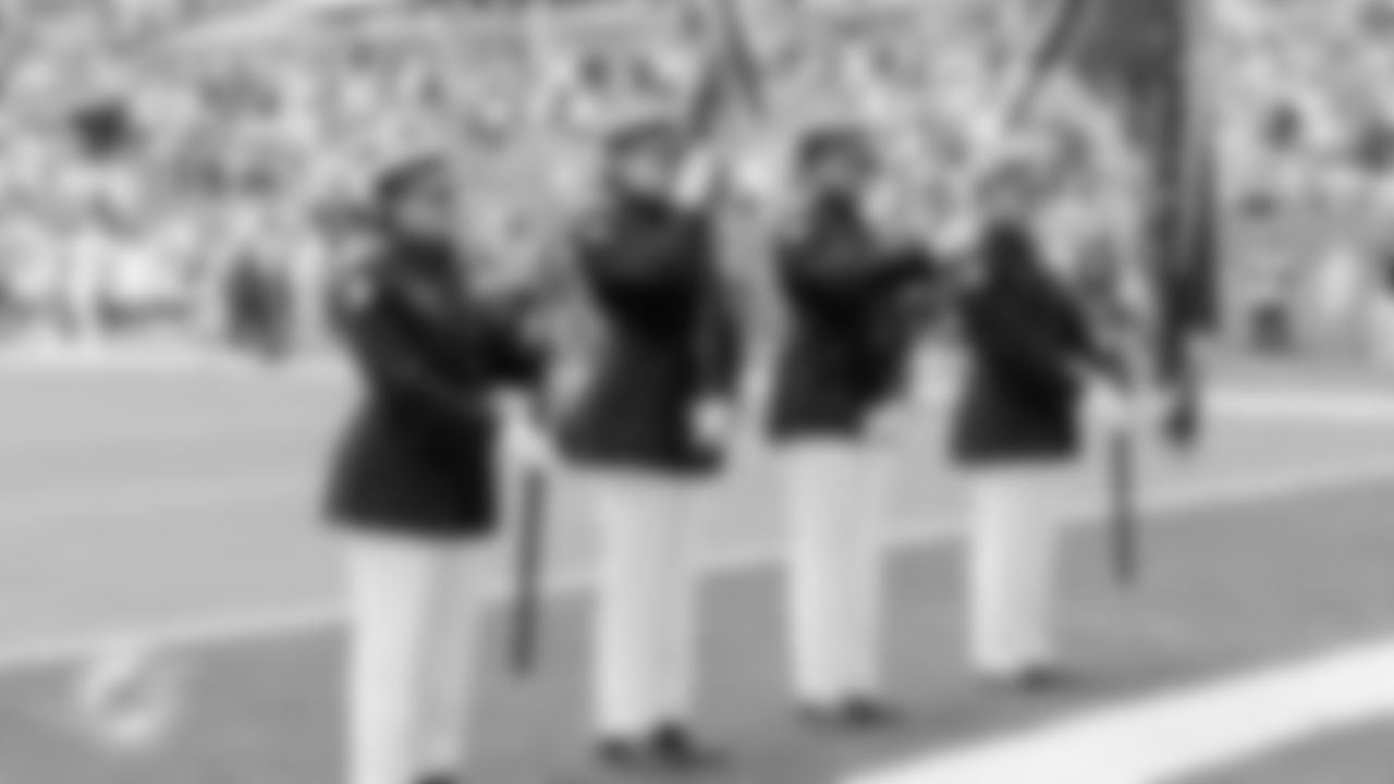 Color Guard stands for the National Anthem before an NFL football game against the New Orleans Saints on Sunday, Nov. 30, 2025 in Miami Gardens, FL. (Lauren Sopourn/Miami Dolphins via AP)