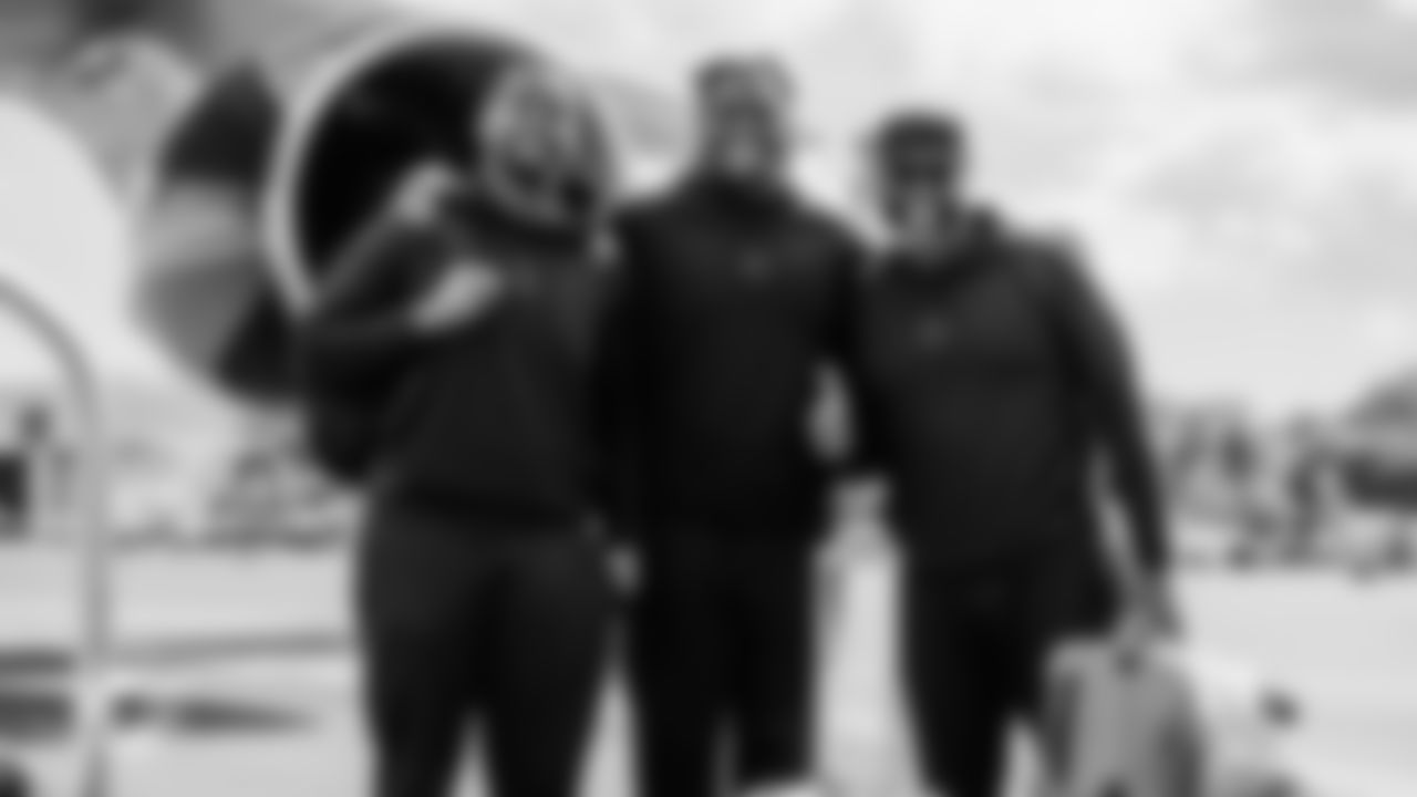 Miami Dolphins tackles Kion Smith (71), Patrick Paul (52) and assistant offensive line coach Lemuel Jeanpierre during arrivals to the plane for travel to New York on Saturday, Dec. 6, 2025, in Fort Lauderdale, Fla. (Tomas Diniz Santos/Miami Dolphins)