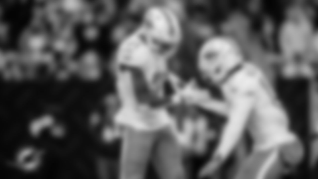 Miami Dolphins running back Ollie Gordon II (31) and wide receiver Jaylen Waddle (17) celebrate a touchdown during an NFL football game against the New York Jets on Sunday, Dec. 7, 2025 in East Rutherford, NJ. (Tomas Diniz Santos/Miami Dolphins via AP)