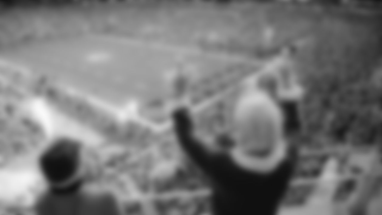 Miami Dolphins fans celebrate during an NFL football game against the Cincinnati Bengals on Sunday, Dec. 21, 2025 in Miami Gardens, FL. (Adler Garfield/Miami Dolphins via AP)