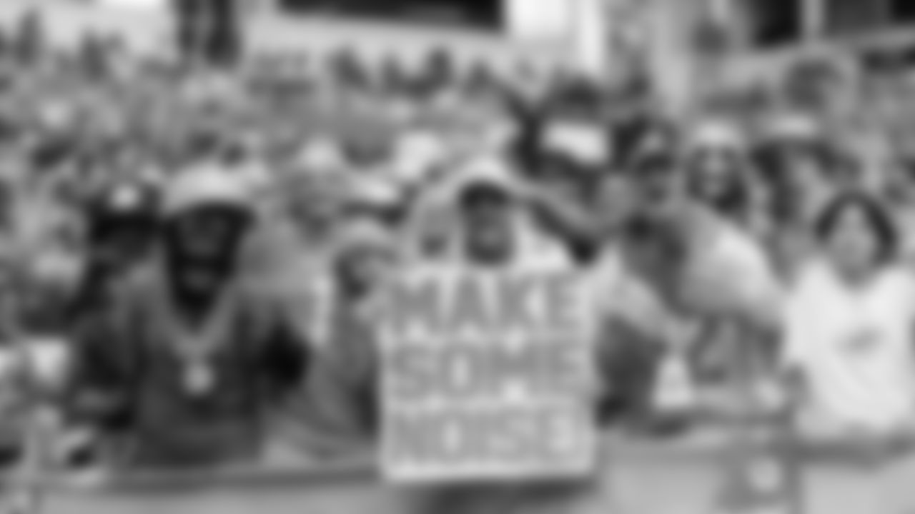 Miami Dolphins fans pose during an NFL football game against the Buffalo Bills on Sunday, Nov. 9, 2025 in Miami Gardens, Fla. (Lauren Sopourn/Miami Dolphins via AP)