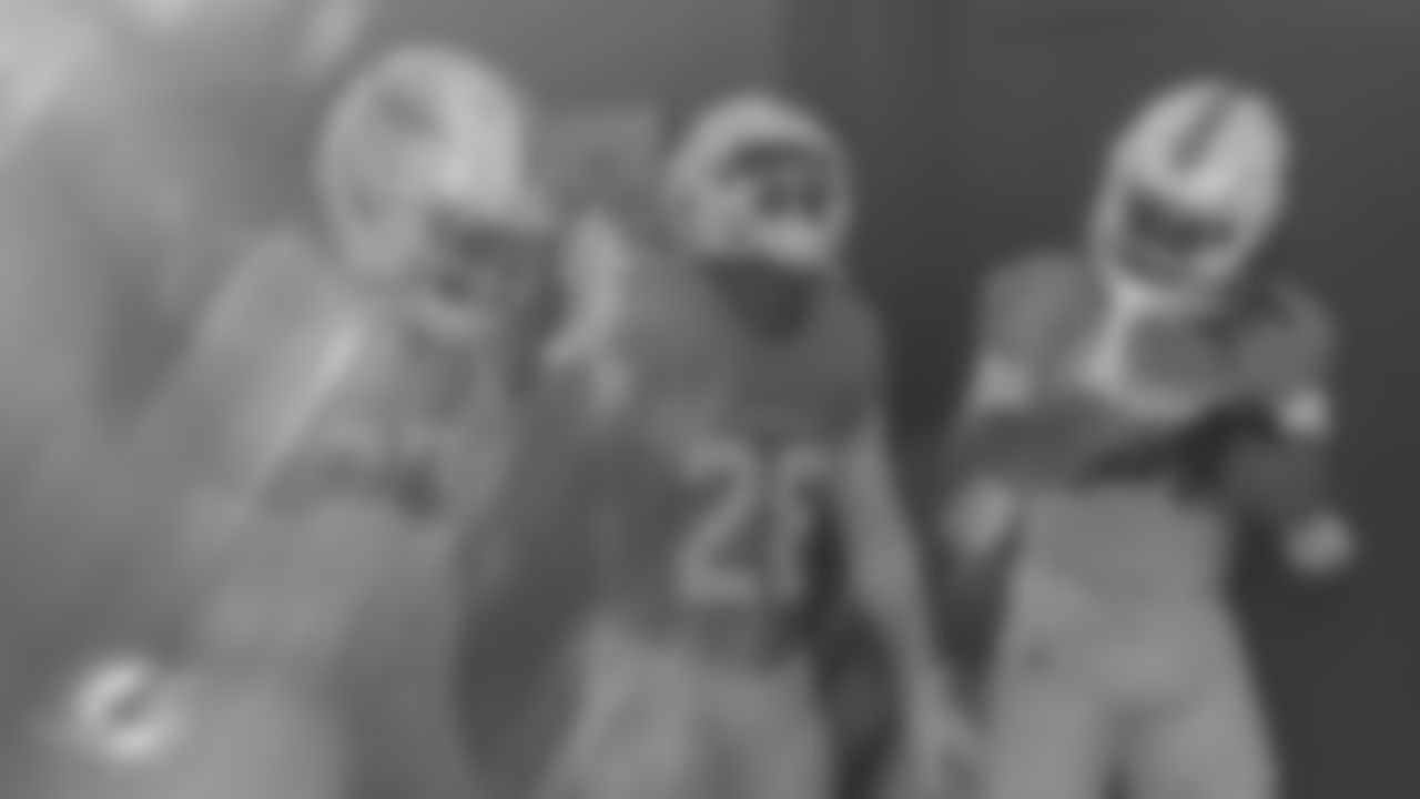 Miami Dolphins wide receiver Jaylen Waddle (17) and running backs De'Von Achane (28) and Jaylen Wright (5) exit the tunnel before an NFL football game against the Tampa Bay Buccaneers on Sunday, Dec. 28, 2025 in Miami Gardens, FL. (AJ Shorter/Miami Dolphins via AP)