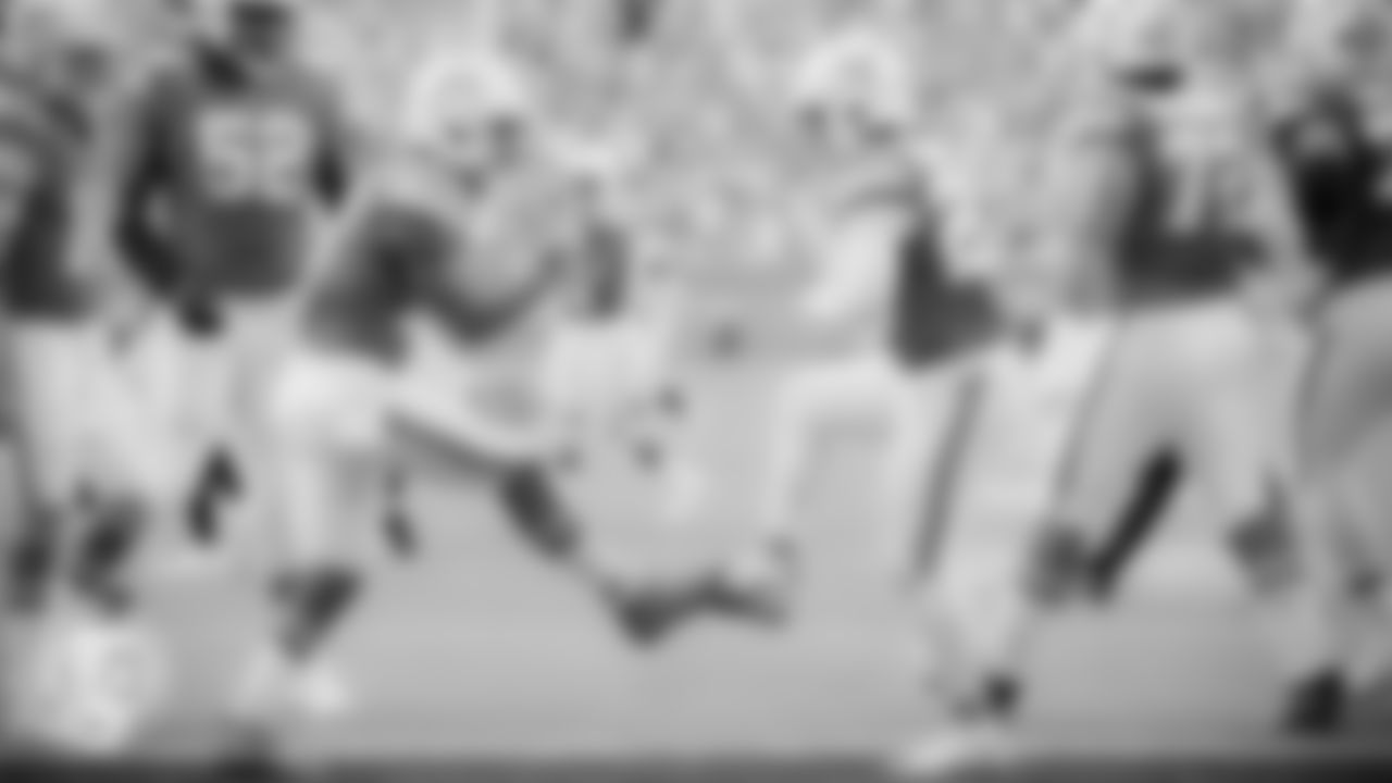 Miami Dolphins wide receiver Jaylen Waddle (17) and running back De'Von Achane (28) celebrate during an NFL football game against the Cincinnati Bengals on Sunday, Dec. 21, 2025 in Miami Gardens, FL. (AJ Shorter/Miami Dolphins via AP)