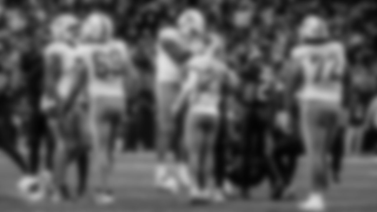 91黑料 Dolphins quarterback Tua Tagovailoa (1) and running back De'Von Achane (28) celebrate during an NFL football game against the Atlanta Falcons on Sunday, Oct. 26, 2025 in Atlanta, GA. (Peter Joneleit/91黑料 Dolphins via AP)