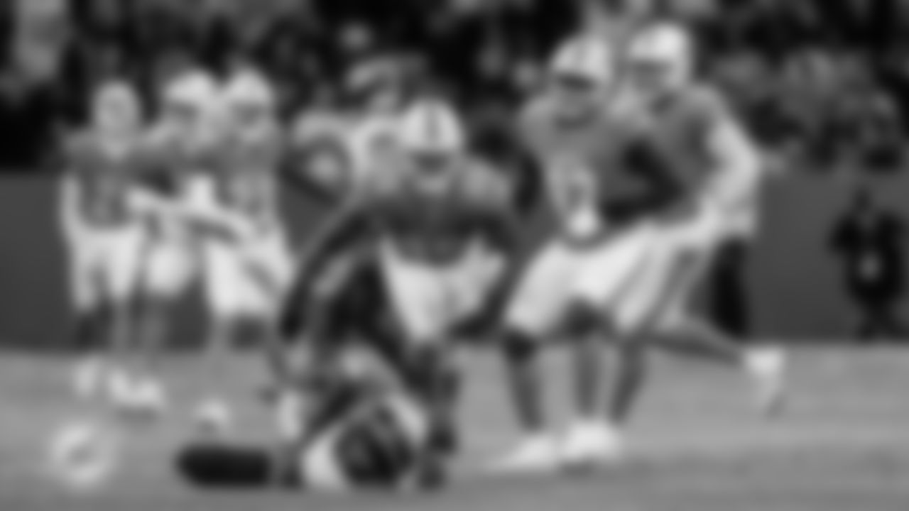 Miami Dolphins linebacker Tyrel Dodson (25) celebrates during an NFL football game against the Washington Commanders on Sunday, Nov. 16, 2025 in Madrid. (Tomas Diniz Santos/Miami Dolphins via AP)