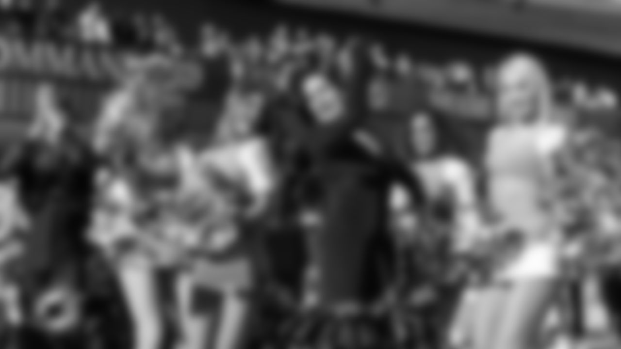 Miami Dolphins Cheerleaders and flamenco dancers outside Bernabéu Stadium before an NFL football game against the Washington Commanders on Sunday, Nov. 16, 2025 in Madrid. (Robby Illanes/Miami Dolphins via AP)