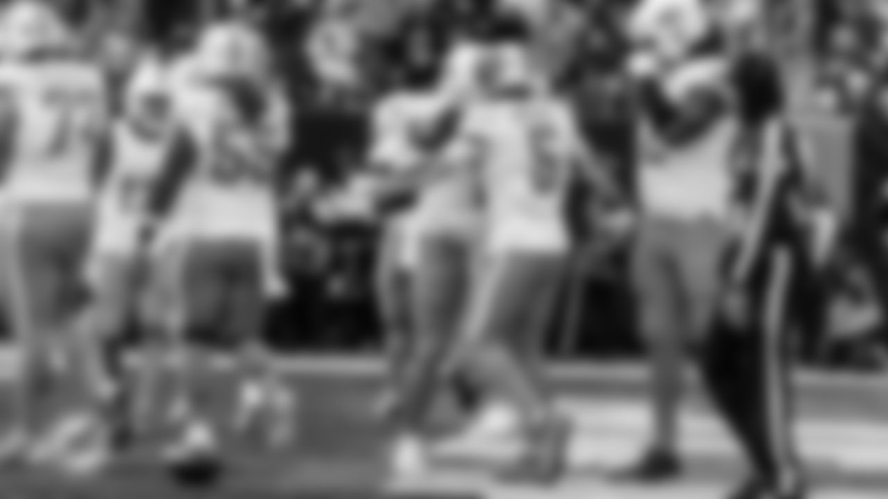 Miami Dolphins quarterback Tua Tagovailoa (1) and running back Jaylen Wright (5) celebrate during an NFL football game against the New York Jets on Sunday, Dec. 7, 2025 in East Rutherford, NJ. (Raul Maristany/Miami Dolphins via AP)