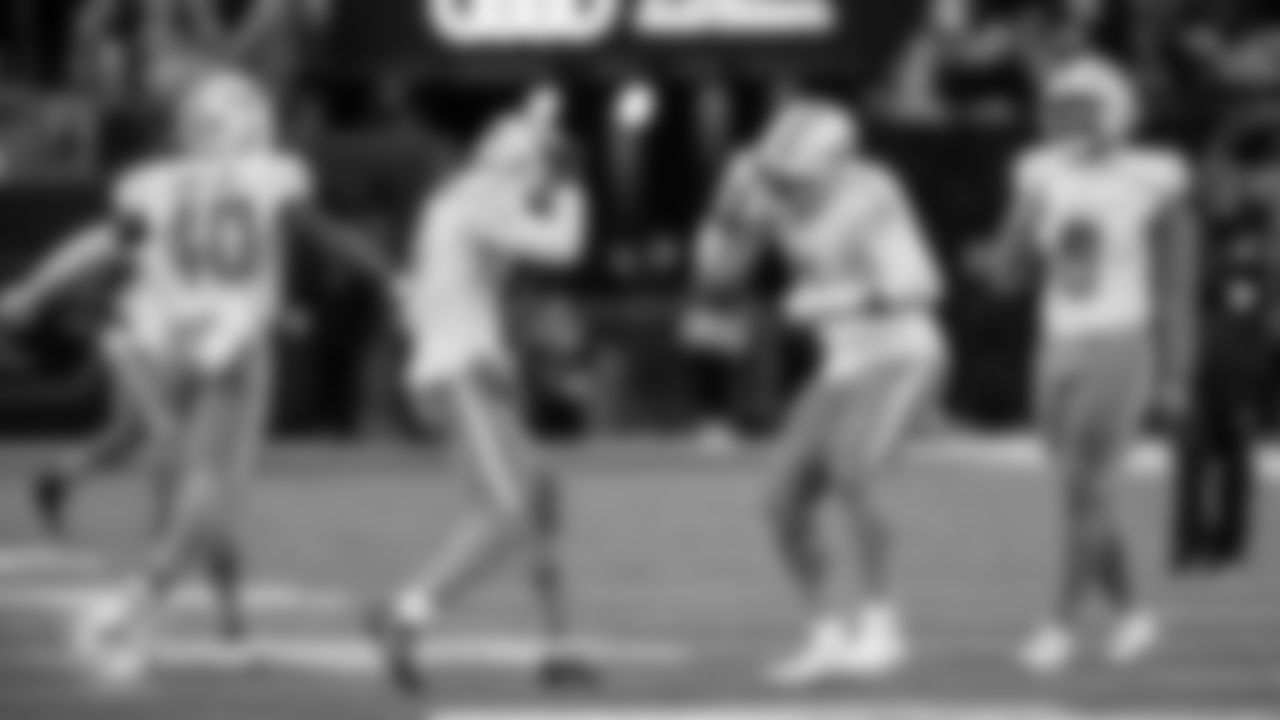 Miami Dolphins safety Ifeatu Melifonwu (9) and linebacker Bradley Chubb (2) celebrate during an NFL football game against the New York Jets on Sunday, Dec. 7, 2025 in East Rutherford, NJ. (Tomas Diniz Santos/Miami Dolphins via AP)