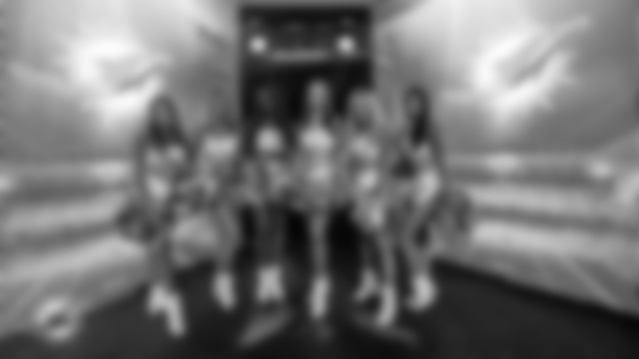 Miami Dolphins Cheerleaders pose before an NFL football game against the Baltimore Ravens on Thursday, Oct. 30, 2025 in Miami Gardens, FL. (Jose Pineiro/Miami Dolphins via AP)