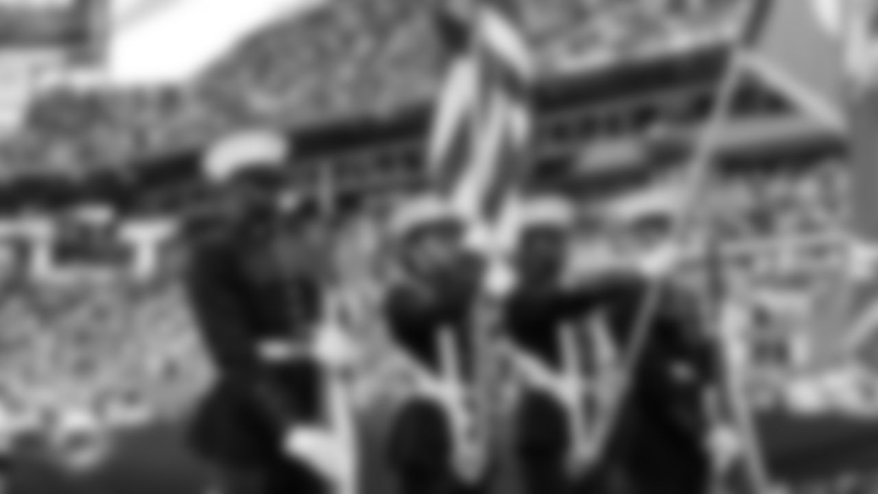 Coast Guard stands for the National Anthem before an NFL football game between the Miami Dolphins and the Buffalo Bills on Sunday, Nov. 9, 2025 in Miami Gardens, Fla. (Robby Illanes/Miami Dolphins via AP)