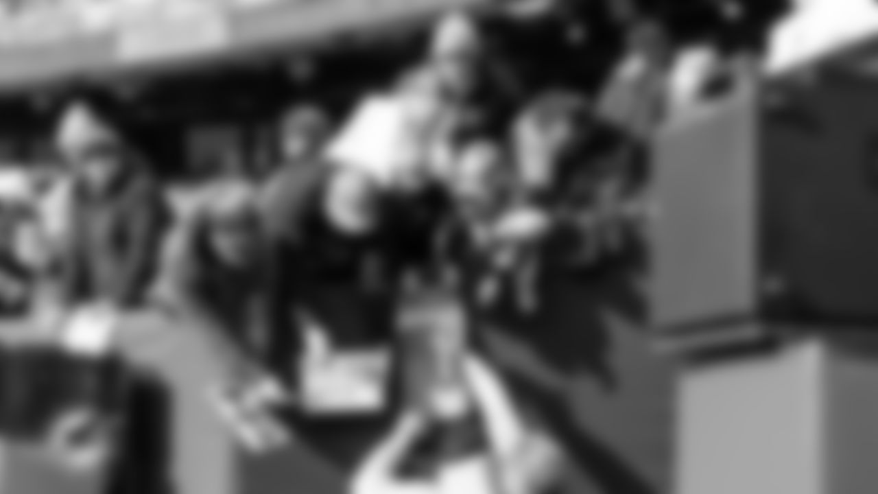 XX signs autographs before an NFL football game against the New York Jets on Sunday, Dec. 7, 2025 in East Rutherford, NJ. (Raul Maristany/Miami Dolphins via AP)