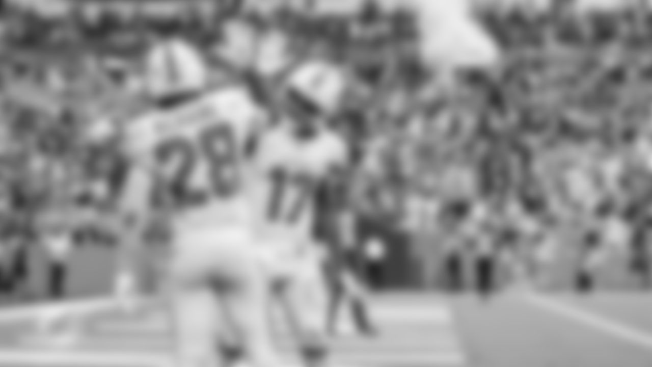Miami Dolphins running back De'Von Achane (28) and wide receiver Jaylen Waddle (17) celebrate during an NFL football game against the Buffalo Bills on Sunday, Nov. 9, 2025 in Miami Gardens, Fla. (Kevin Tubbergen/Miami Dolphins via AP)