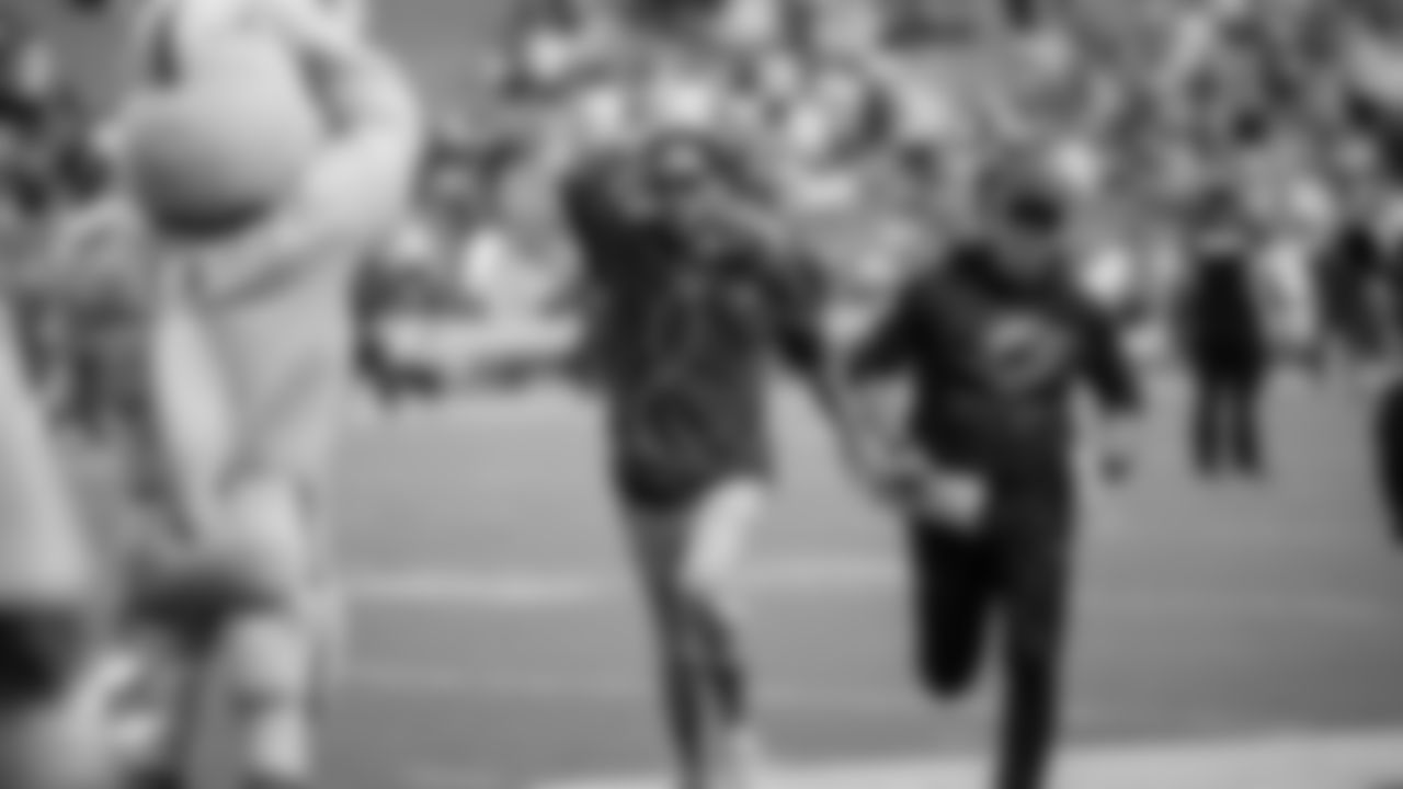 Miami Dolphins head coach Mike McDaniel celebrates as he exists the field after an NFL football game against the Buffalo Bills on Sunday, Nov. 9, 2025 in Miami Gardens, Fla. (Jose Pineiro/Miami Dolphins via AP)