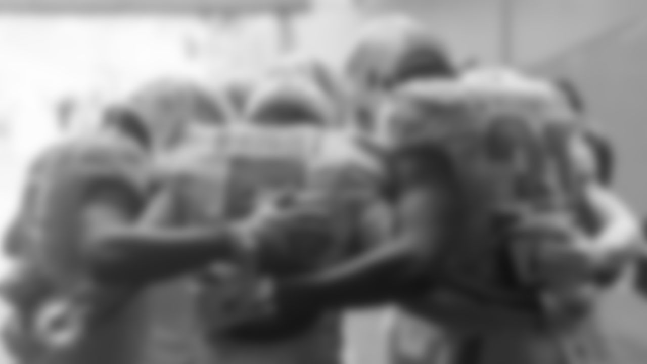 Miami Dolphins wide receiver Malik Washington (6) and running backs Jaylen Wright (5) and Ollie Gordon II (31) huddle before an NFL football game against the New Orleans Saints on Sunday, Nov. 30, 2025 in Miami Gardens, FL. (AJ Shorter/Miami Dolphins via AP)