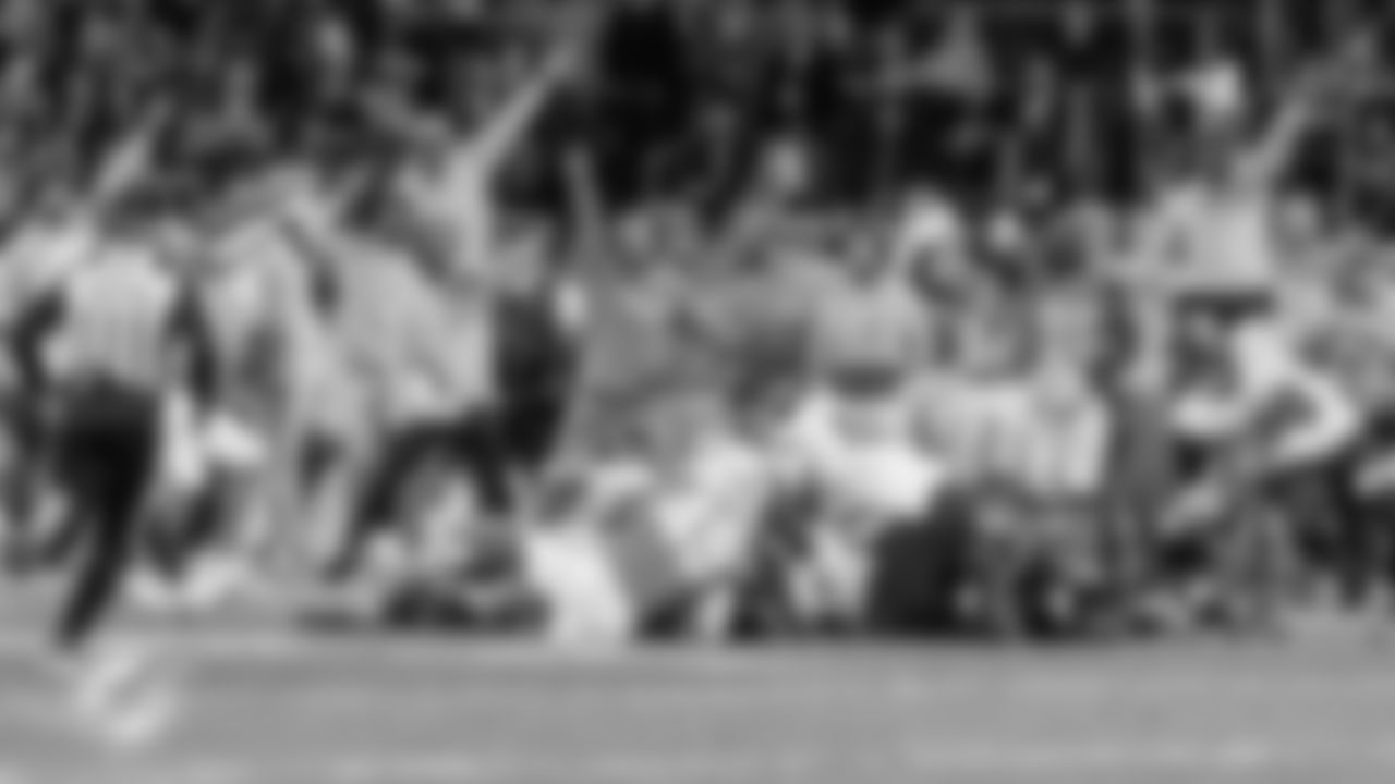 Miami Dolphins sideline celebrates a fumble recovery by cornerback Jack Jones (23) during an NFL football game against the Washington Commanders on Sunday, Nov. 16, 2025 in Madrid. (Robby Illanes/Miami Dolphins via AP)