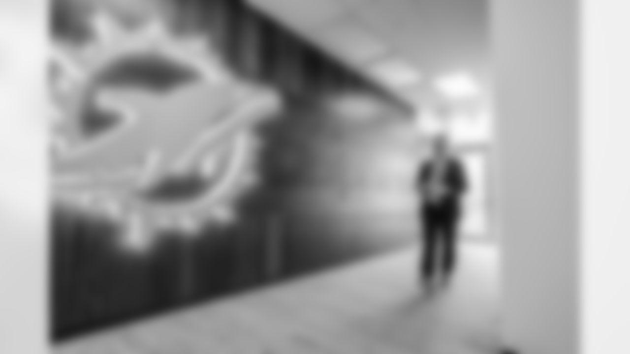 Miami Dolphins new head coach Jeff Hafley signs his contract at the Baptist Health Training Facility on Thursday, Jan. 22, 2026, in Miami Gardens, Fla. (Peter McMahon/Miami Dolphins)