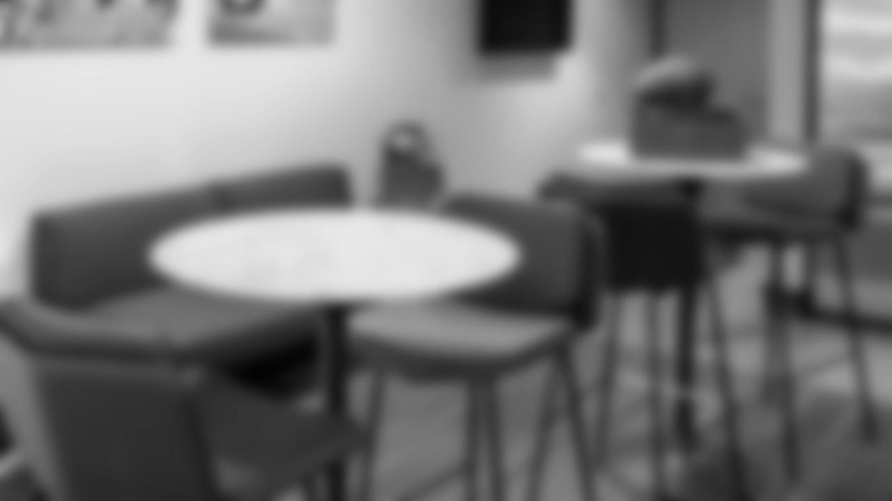 Hybrid Layout: One (1) three-person couch; Two (2) high top cocktail tables; Two (2) barstools per table.