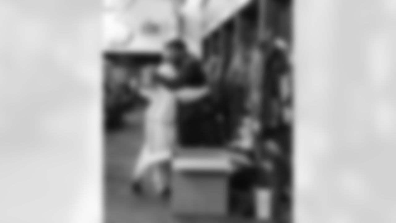 DB Cooper DeJean & DT Jordan Davis embracing.