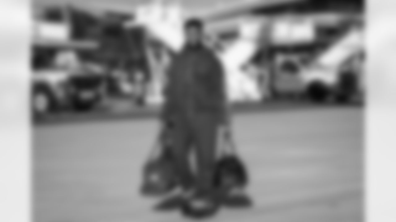 Atlanta Falcons wide receiver KhaDarel Hodge #4 boards the plane at Hartsfield-Jackson International Airport in Atlanta, Ga. on Saturday, November 6, 2025. (Photo by Taylor McLaughlin/Atlanta Falcons)