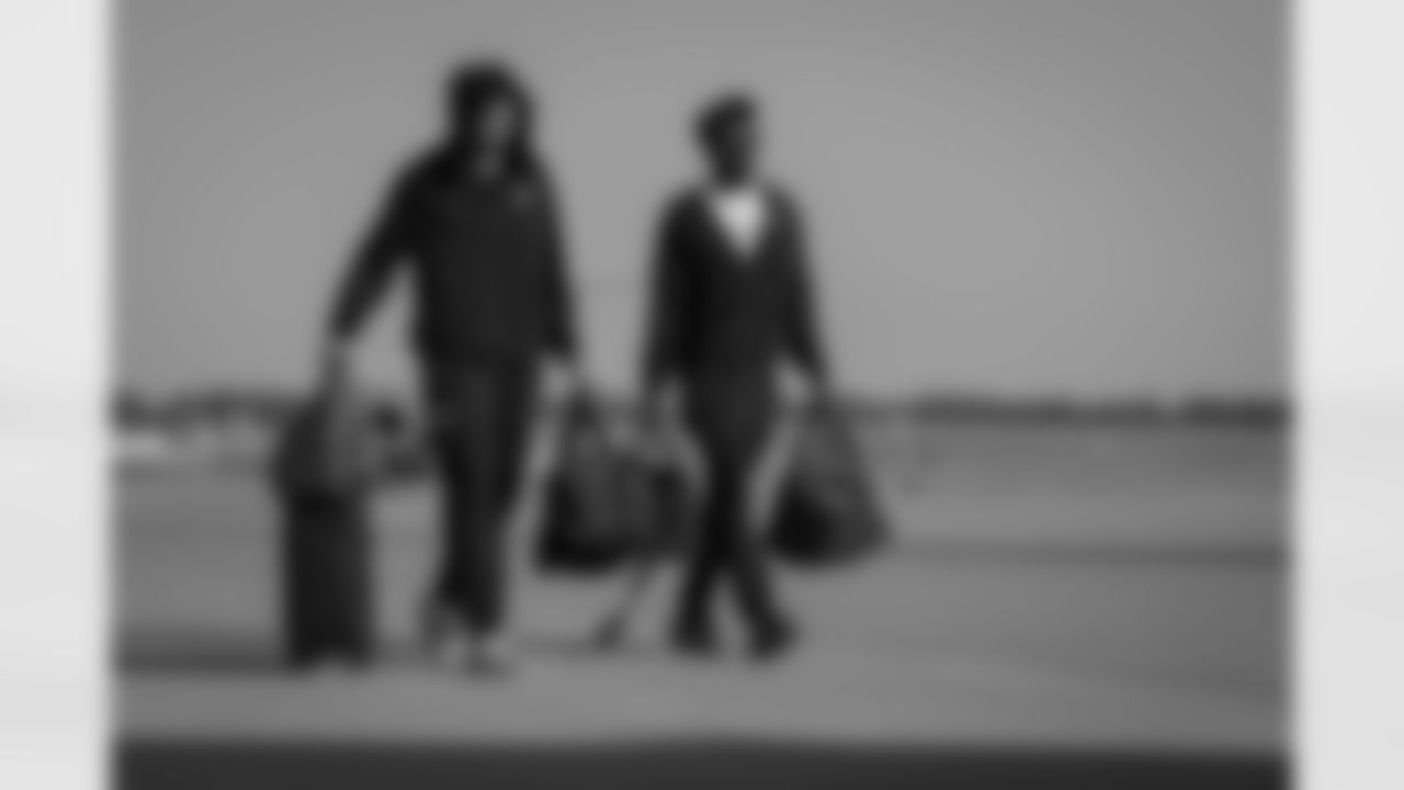 Atlanta Falcons wide receiver Drake London #5 and Atlanta Falcons wide receiver Chris Blair #19 board the plane at Hartsfield-Jackson International Airport in Atlanta, Ga. on Saturday, November 6, 2025. (Photo by Taylor McLaughlin/Atlanta Falcons)