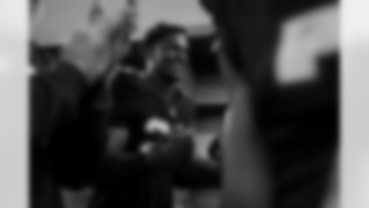 Atlanta Falcons edge rusher James Pearce Jr. #27 celebrates in the locker room during the Week 15 Game against the Tampa Bay Buccaneers at Raymond James Stadium in Tampa, Florida on Thursday, December 11, 2025. (Photo by Jay Bendlin/Atlanta Falcons)