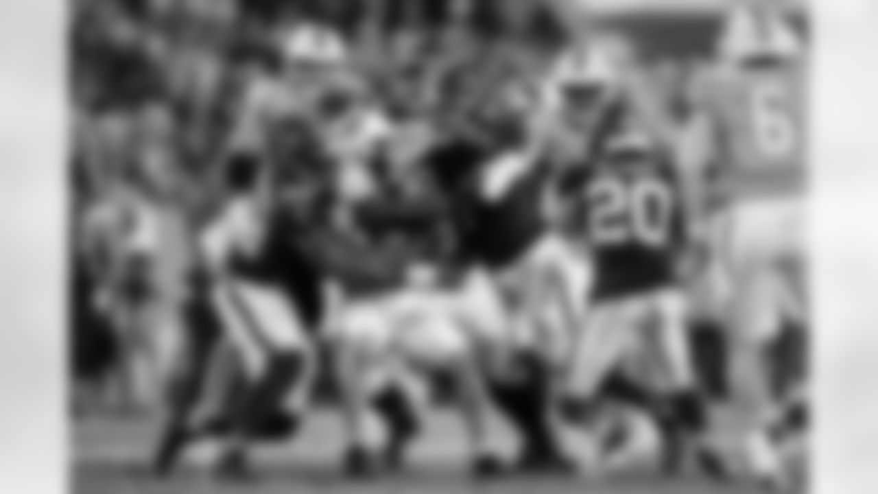 Atlanta Falcons defensive lineman David Onyemata #90 and Atlanta Falcons defensive lineman Ruke Orhorhoro #98 make a tackle during the Week 15 Game against the Tampa Bay Buccaneers at Raymond James Stadium in Tampa, Florida on Thursday, December 11, 2025. (Photo by Mitch Martin/Atlanta Falcons)