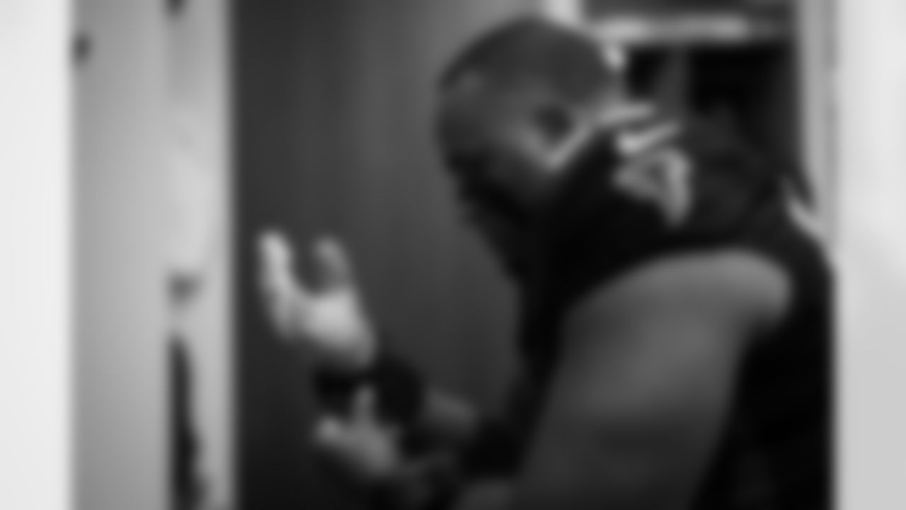 Atlanta Falcons offensive lineman Kyle Hinton #68 prepares in the locker room before the Week 11 Game against the Carolina Panthers at Mercedes-Benz Stadium in Atlanta, Georgia on Sunday, November 16, 2025. (Photo by Jay Bendlin/Atlanta Falcons)