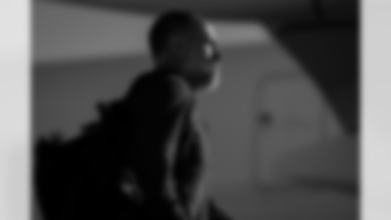 Atlanta Falcons defensive coordinator Jeff Ulbrich boards the plane at Hartsfield-Jackson International Airport in Atlanta, Ga. on Saturday, December 20, 2025. (Photo by Jay Bendlin/Atlanta Falcons)